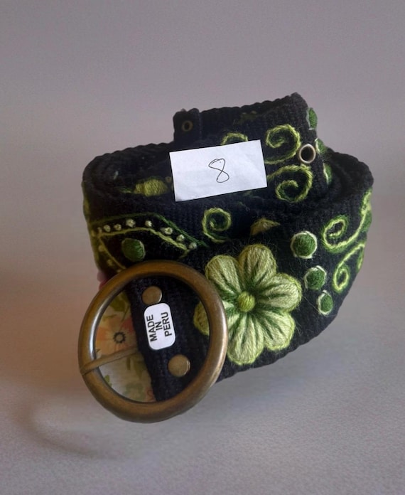 Hand embroidered wool belts from Peru