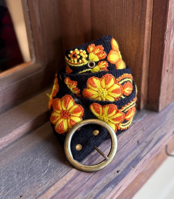 Hand embroidered wool belts from Peru
