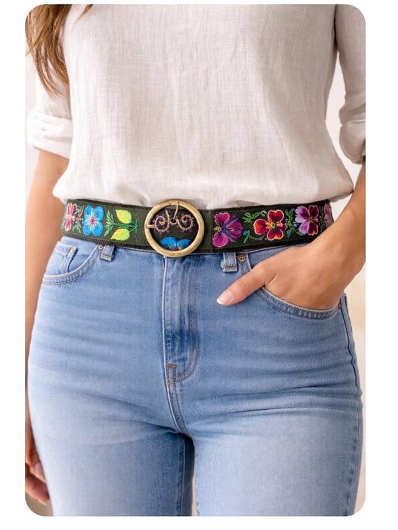 Hand embroidered wool belts from Peru