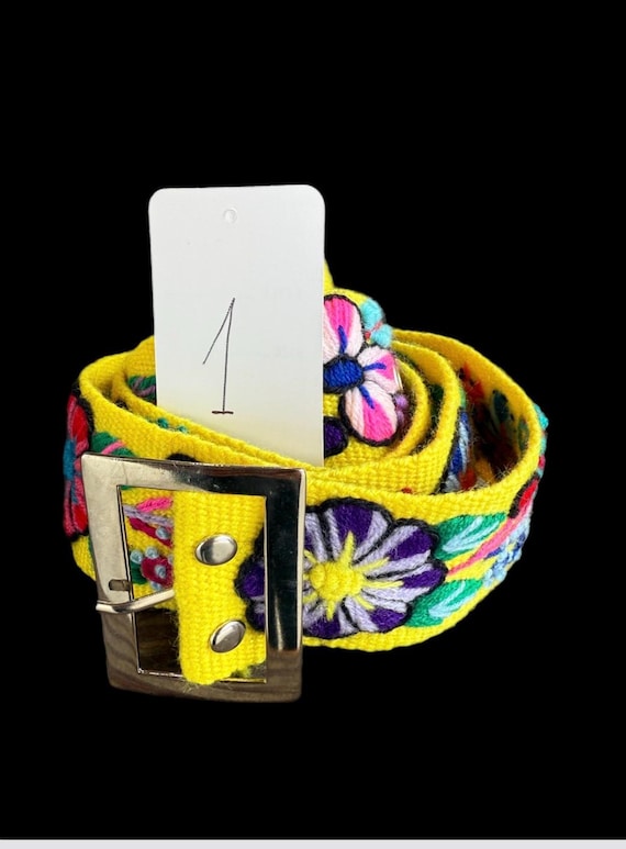 Hand embroidered wool belts from Peru