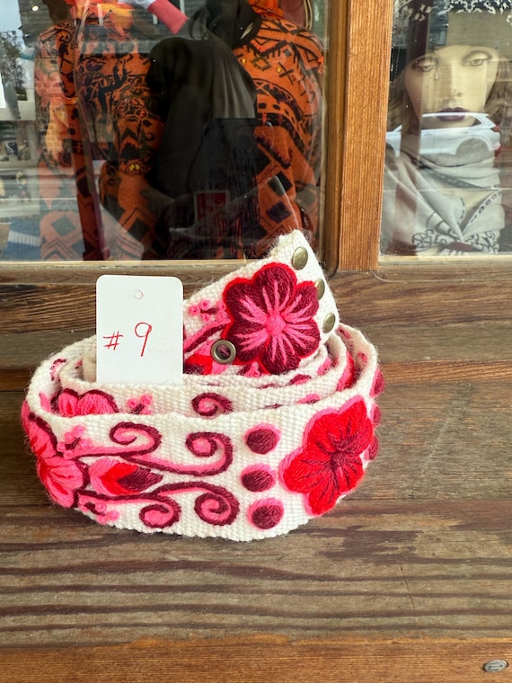 Hand embroidered wool belts from Peru