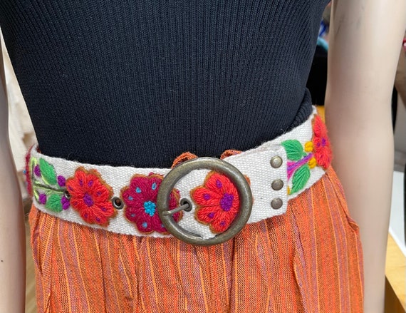 Hand embroidered wool belts from Peru
