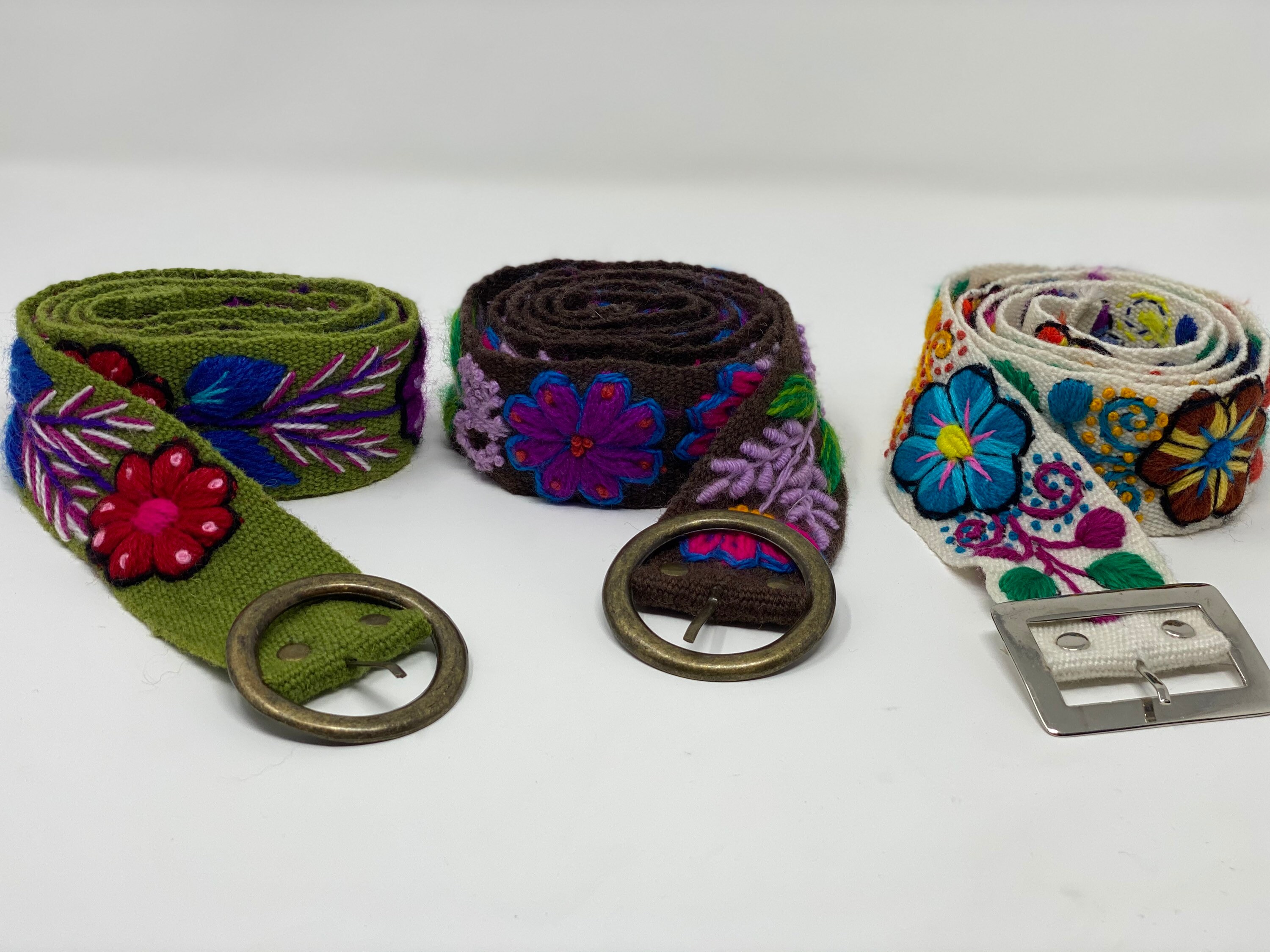 Hand embroidered wool belts from Peru