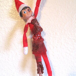 creepy elf doll