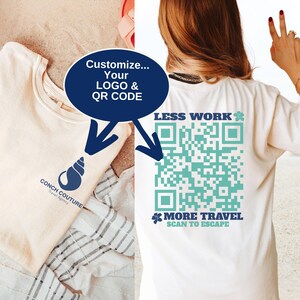 May include: Two cream-colored t-shirts. One displays a blue seashell logo with "CONCH COUTURE Travel Agency" text. The other features a large teal QR code with the text "LESS WORK" and "MORE TRAVEL SCAN TO ESCAPE". The image suggests customization options for logos and QR codes.