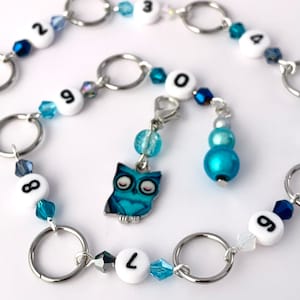 Row counter chain 10mm diameter rings - blue crystal beads with owl marker