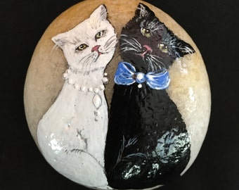 Handgeschilderde zwart-witte kattenstenen