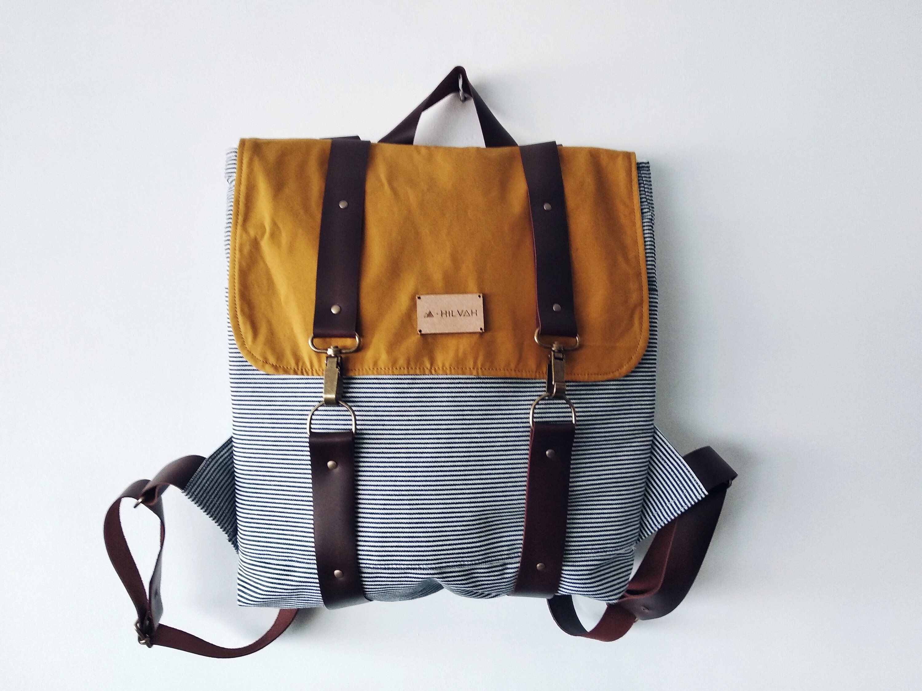 striped leather backpack