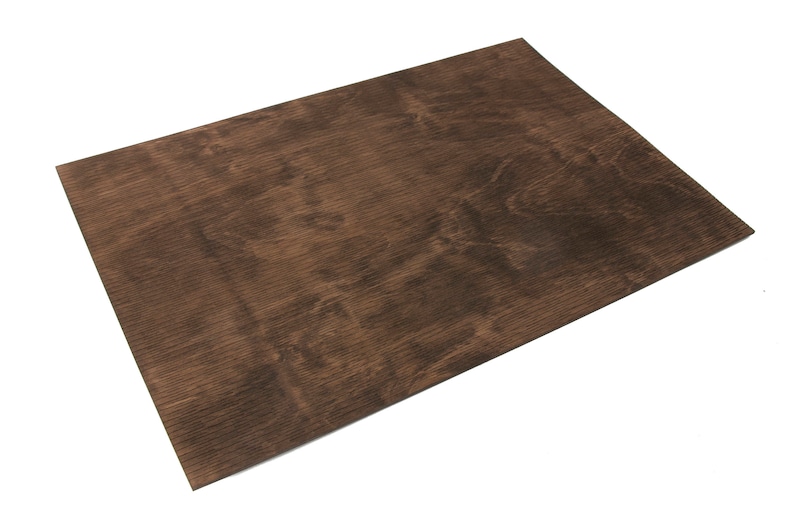 May include: A brown woodgrain textured sheet of plywood.