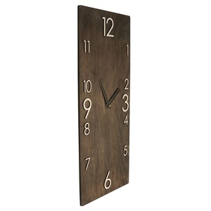 May include: A dark brown wooden clock with white numbers and black hands. The clock is rectangular and has a simple design.
