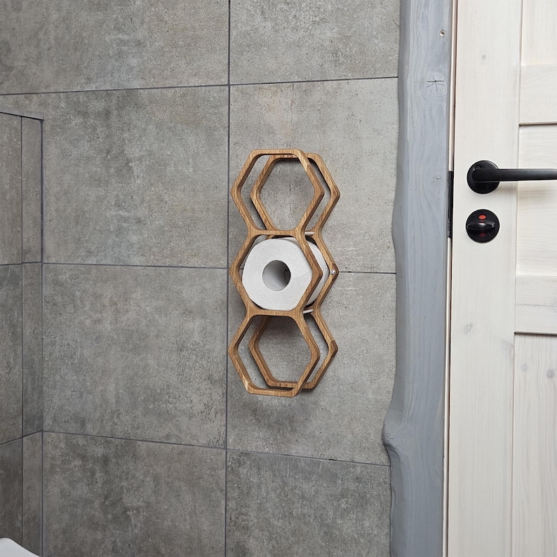 toilet paper rack wood, rustic TP wall shelf, hexagon toilet paper holder, farmhouse wall-mounted bathroom storage, floating wood tissue holder, compact roll shelf, honeycomb toilet paper organizer, bathroom toilet shelf, wall hanging toilet paper holder, modern rustic wood decor