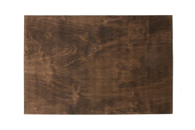 May include: A close-up of a dark brown wood grain surface.