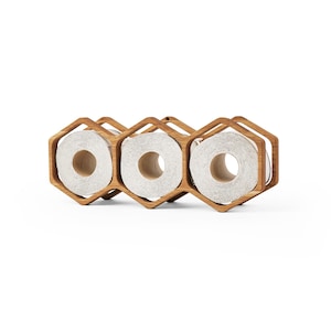 toilet paper storage shelf, floating wood TP holder, hexagon bathroom decor, rustic wall toilet paper rack, modern bathroom organizer, honeycomb toilet roll rack, toilet tissue wall mount, farmhouse wooden bathroom shelf, lightweight wood TP holder, stylish bathroom rack
