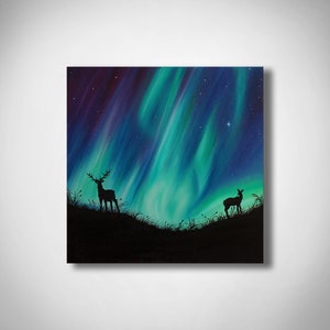 May include: A painting of a deer and a fawn silhouetted against a vibrant green and purple aurora borealis. The sky is filled with stars.