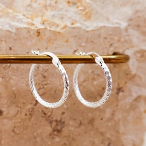 Shiny sterling silver hoops simple classic design