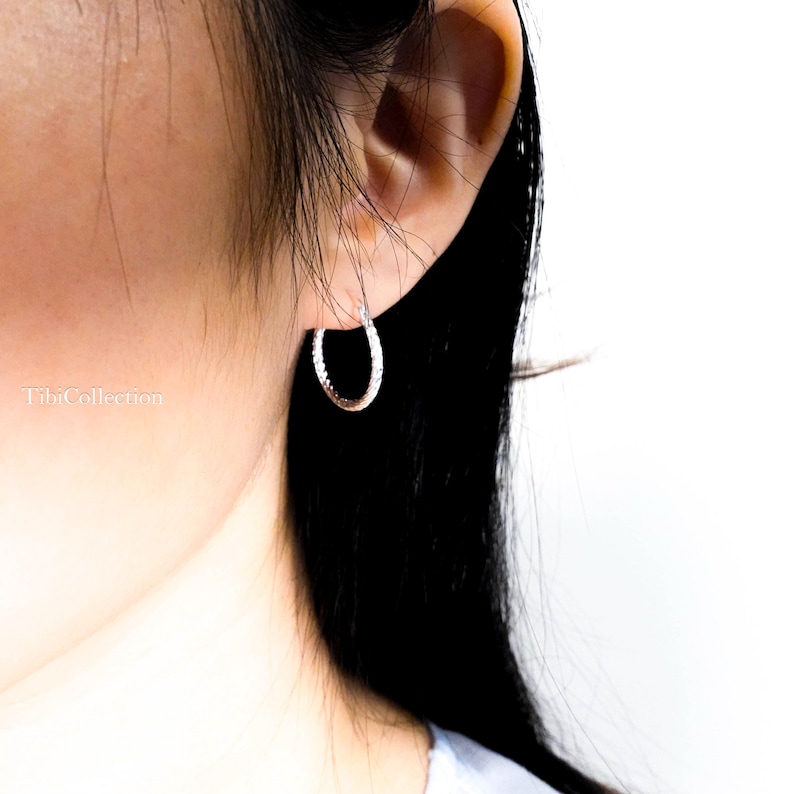 Twisted texture silver hoop earrings modern classic style