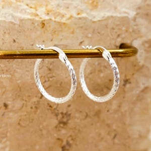 Textured shiny silver hoop earrings minimalist jewelry