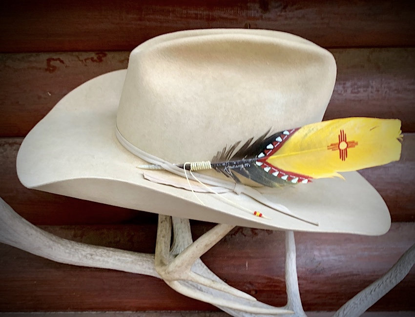 Zia sun symbol, hat feather, New Mexico flag cowboy hat feather