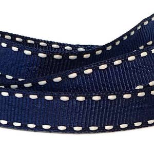 May include: Navy blue ribbon with a white stitched edge. The ribbon is folded in half, showing the stitching on both sides.