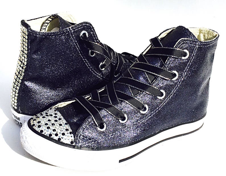 black shoelaces with silver tips