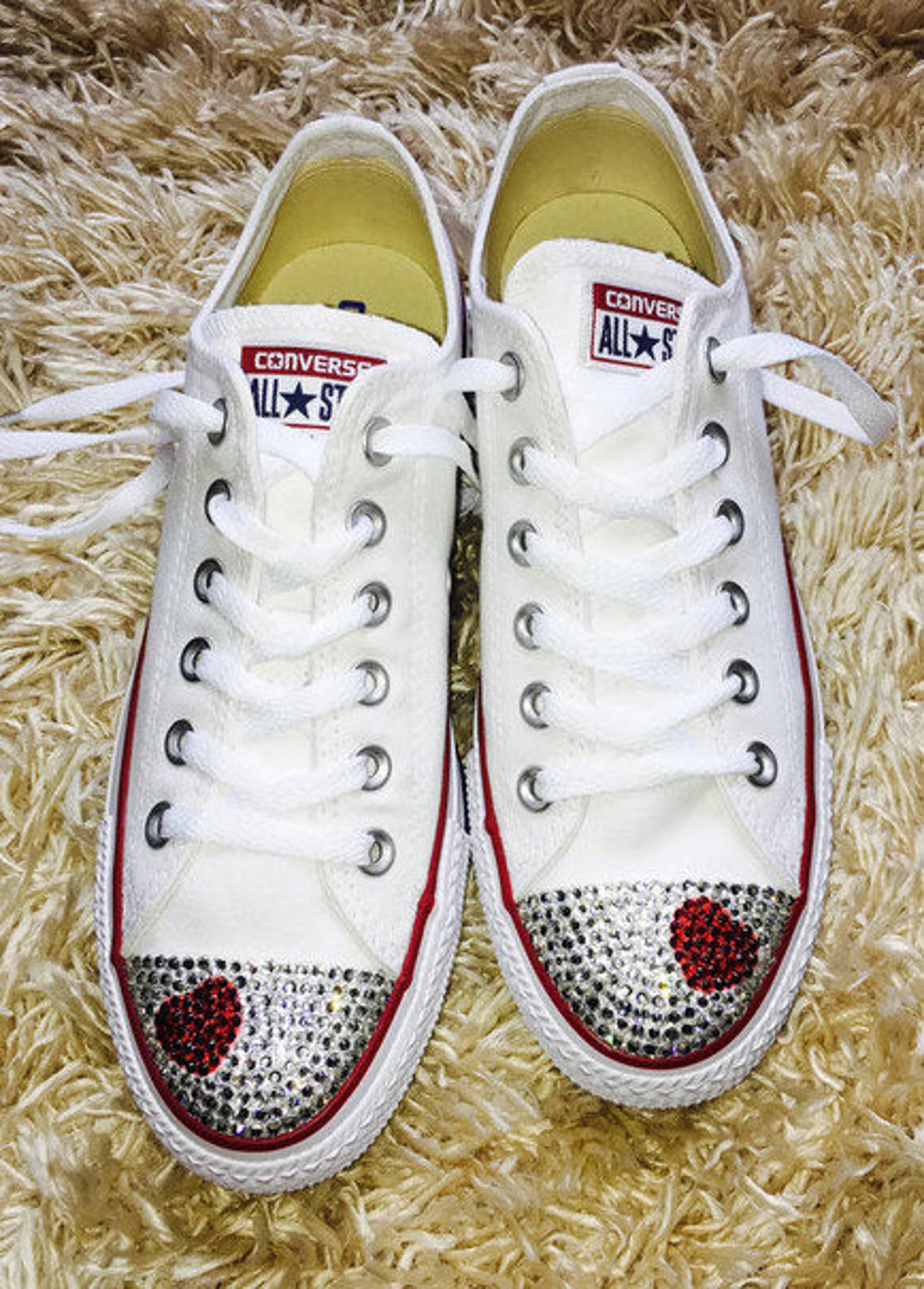converse with a heart on it