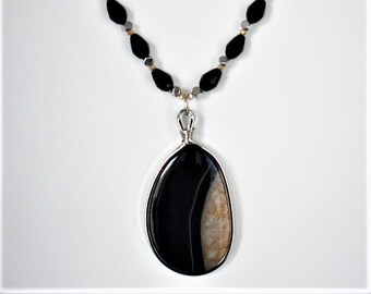 Brown and Black Beaded Necklace with Teardrop Pendant