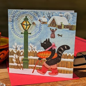 Carte de chat noir en bottes d’hiver, carte de Noël pour les amoureux des chats, Yuri Vasnetsov, carte de Noël vierge d’art populaire enneigé