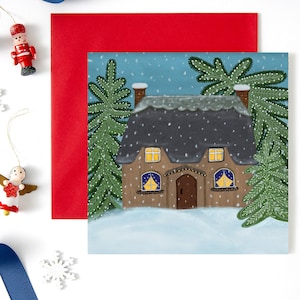 Chaumière dans la neige carte de Noël vierge au Royaume-Uni