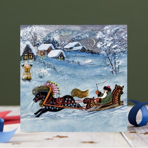 Carte de Noël vierge avec art hivernal enneigé, luge du Père Noël