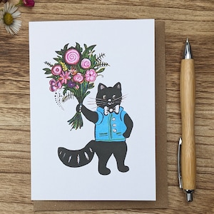 Carte de bouquet de chat noir avec des fleurs roses, carte d'anniversaire de chat