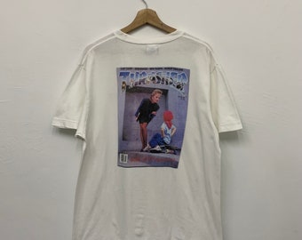 Maglietta vintage della rivista di skateboard Thrasher, taglia L, con foto della rivista.