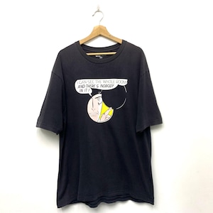 May include: Black t-shirt with a comic-style graphic. The graphic features a person's face inside a circle with a speech bubble that reads, "I CAN SEE THE WHOLE ROOM AND THERE'S NOBODY IN IT!"