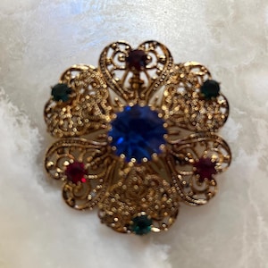 Gold Tone Filigree Openwork Brooch with Rhinestones