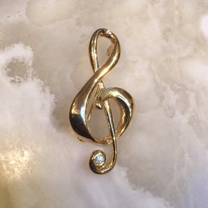 Spilla in acciaio Chiave di Violino con strass (Color Oro