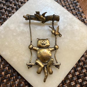 JJ Jonette Bronze Tone Cat Swinging on a Swing Brooch
