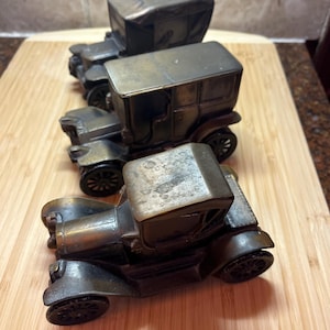 Lot of 3  Bathrico Car Banks - 1908, 1910, and 1915