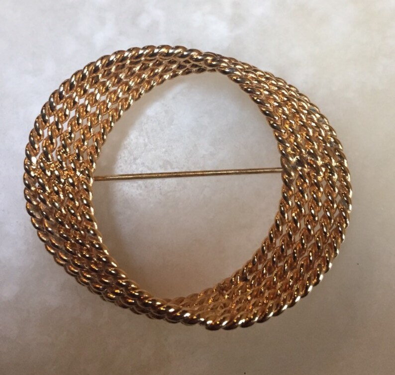 Monet Gold Tone Circular Braided Brooch