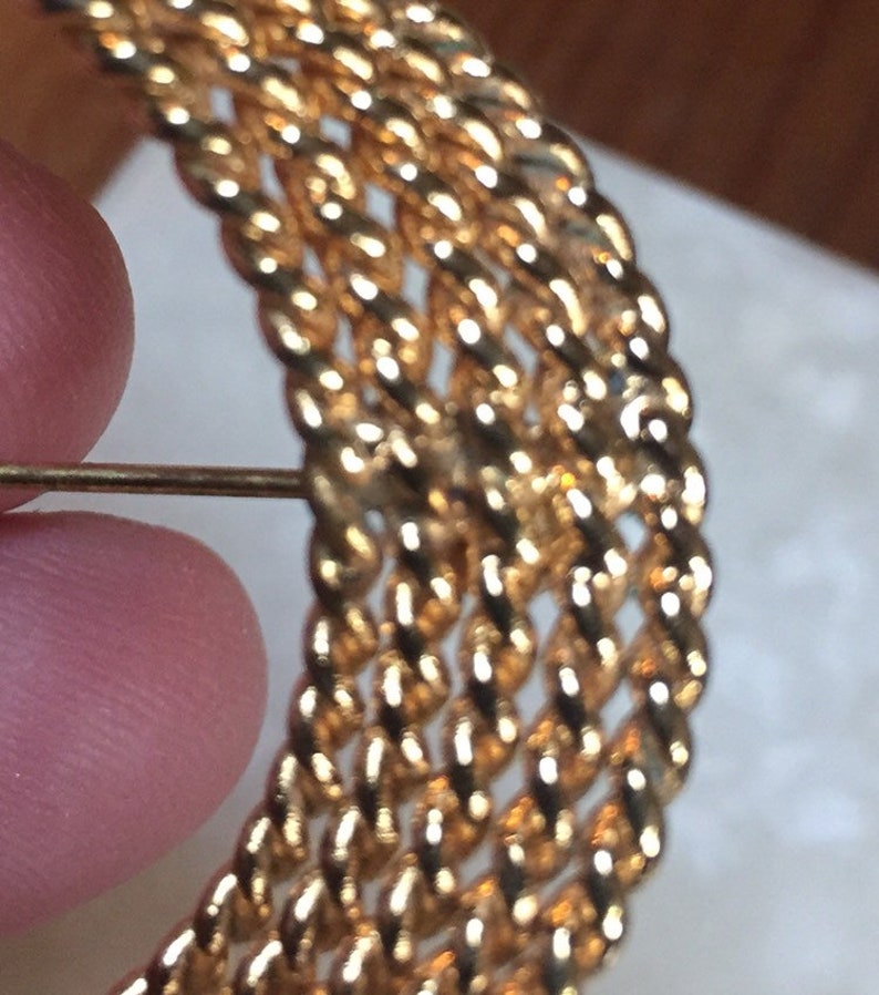 Monet Gold Tone Circular Braided Brooch
