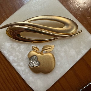 2 Toma Gold Tone Brooches - Large Toma Bar Brooch and Rhinestone Apple Pin