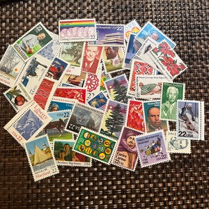 40 Uncancelled United States Stamps - 22 cents
