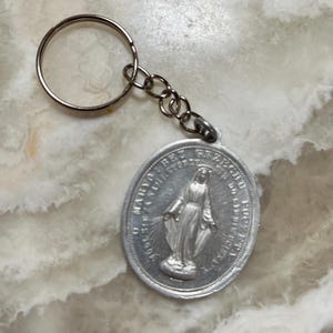 Vintage Miraculous Mary Aluminum Keychain