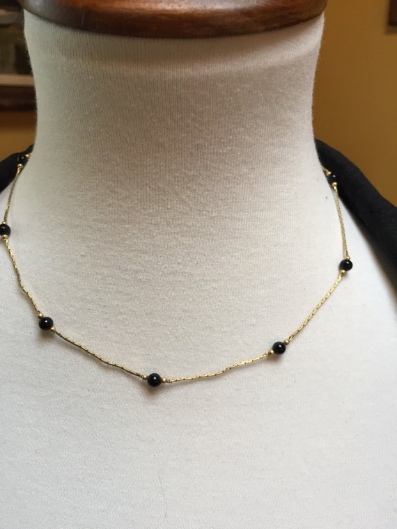 neck chain with black beads