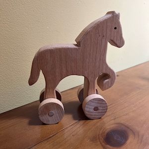 Holz Pferd auf Rädern Spielzeug