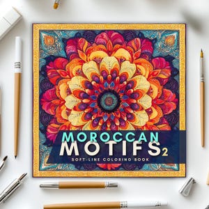 May include: A colouring book with a colourful Moroccan motif on the cover. The title of the book is "Moroccan Motifs 2: Soft-Line Colouring Book".