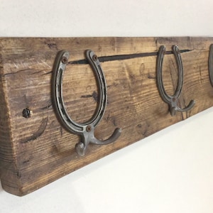 Horse shoe coat hooks