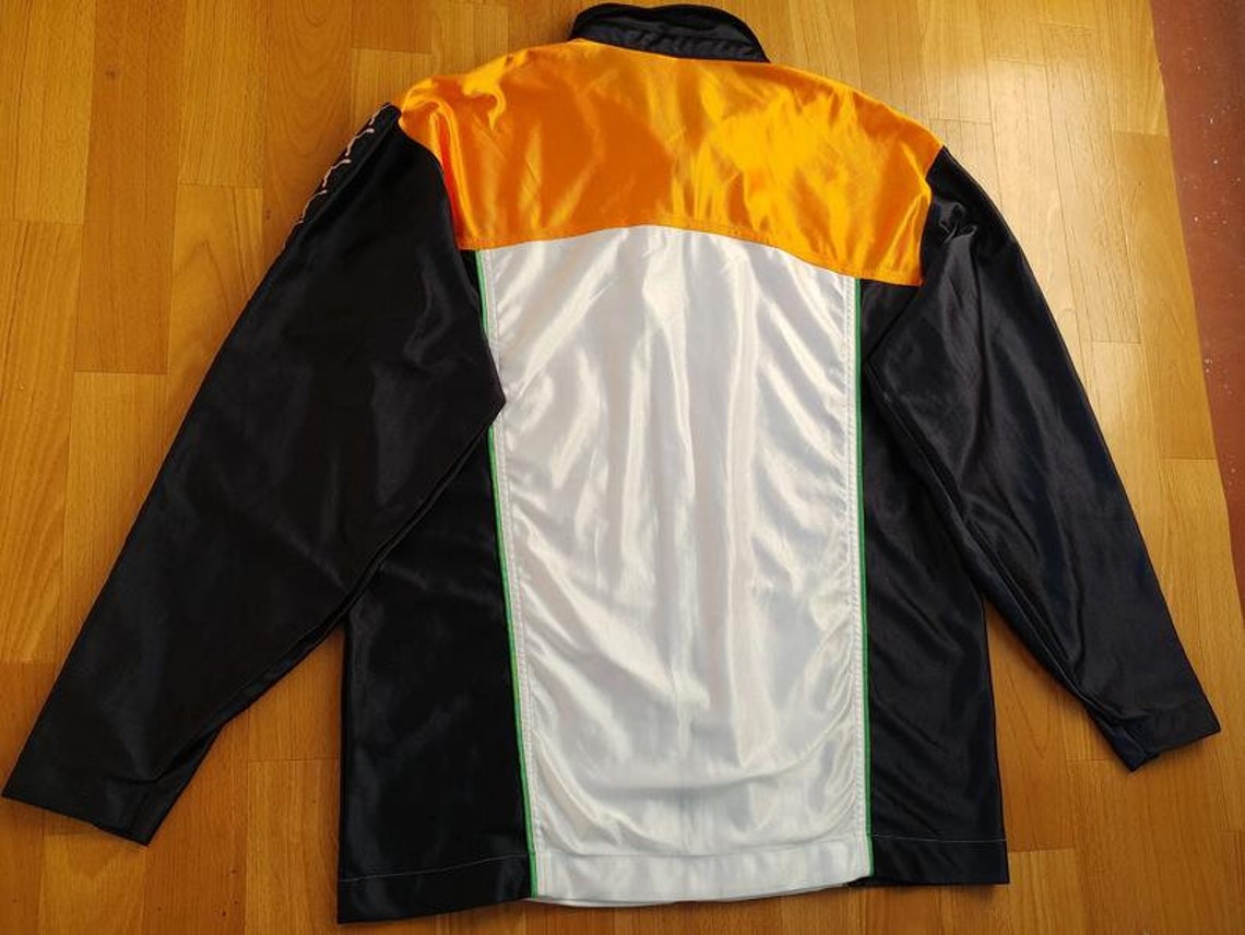 orange and black puma jacket