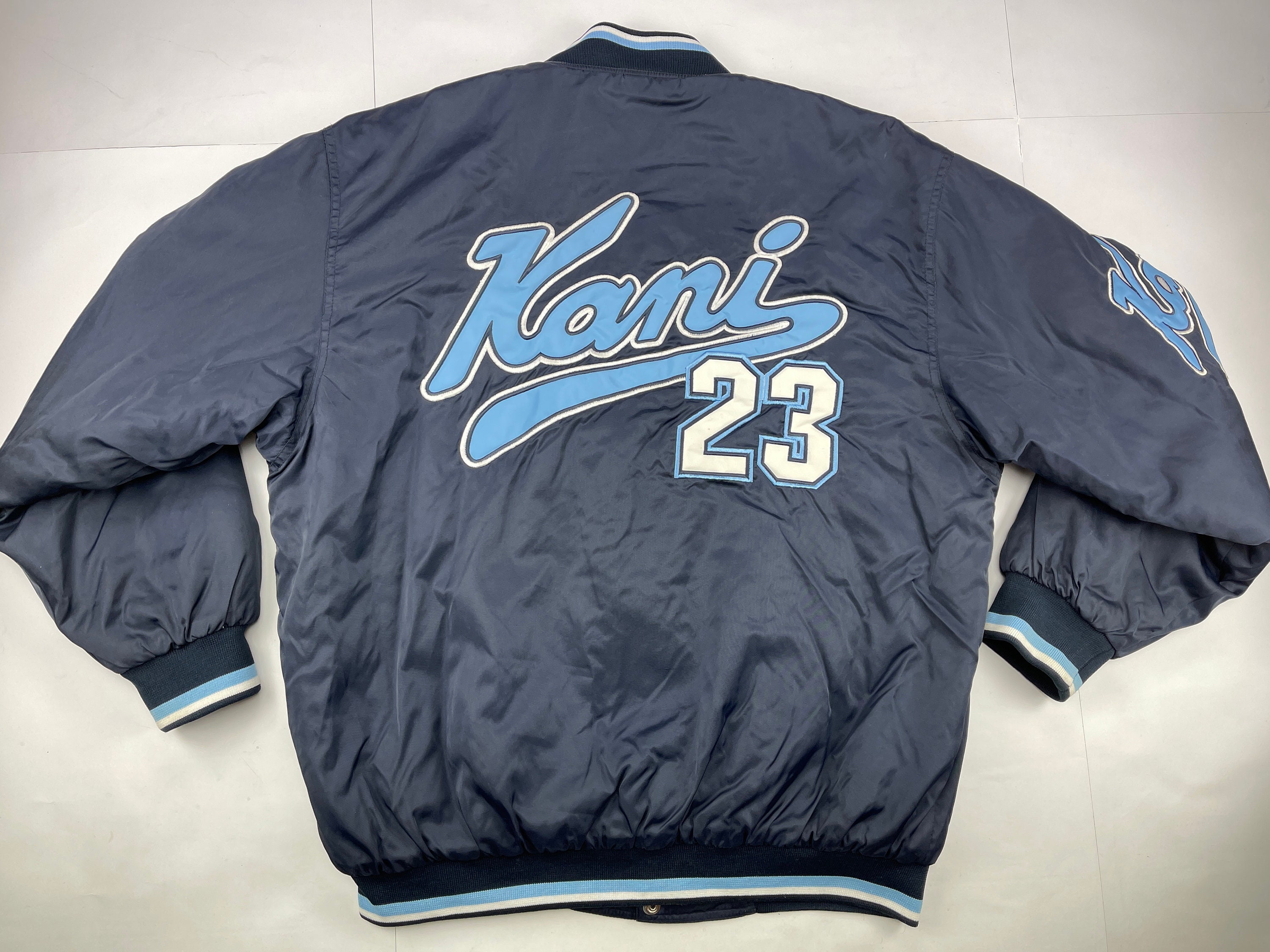 Karl Kani retro spliced paisley varsity jacket in blue and beige