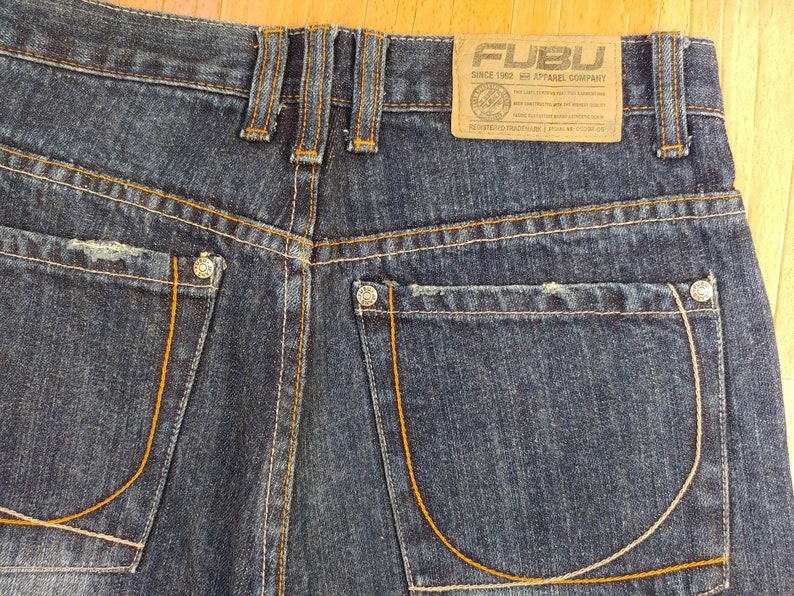 1990s hip hop shirt FUBU jeans carpenter loose fit of 90s hip-hop clothing old school blue OG gangsta rap vintage baggy jeans size W 28