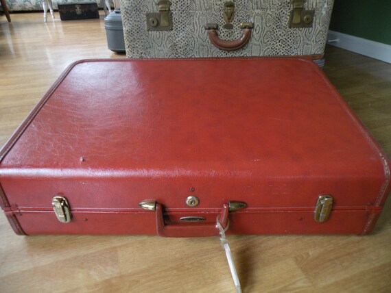 taperlite vintage luggage