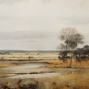 painting showing mountains lake and tree lines